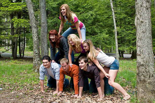 seven college age friends forming a human pyramid. deep creek lakealypse